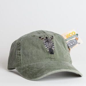 A hat with a zebra on it's side.