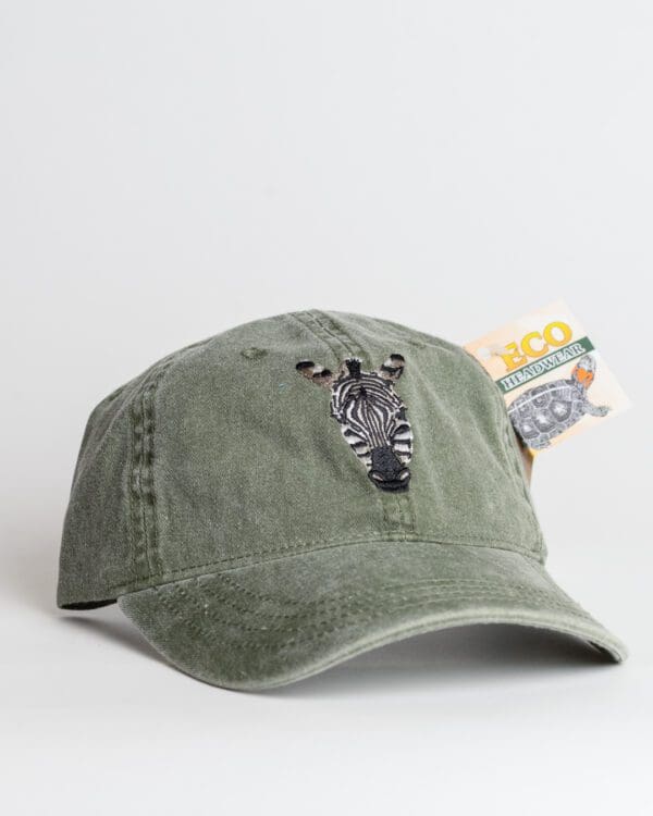 A hat with a zebra on it's side.