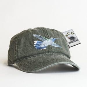 A hat with a bird on it is shown.