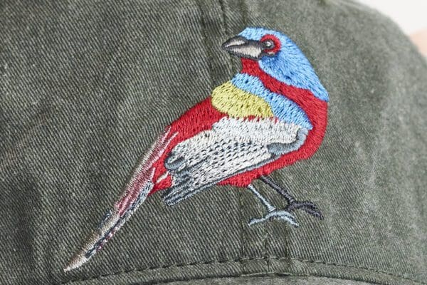A close up of the bird on the hat