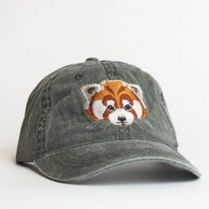 A hat with an animal face on it.