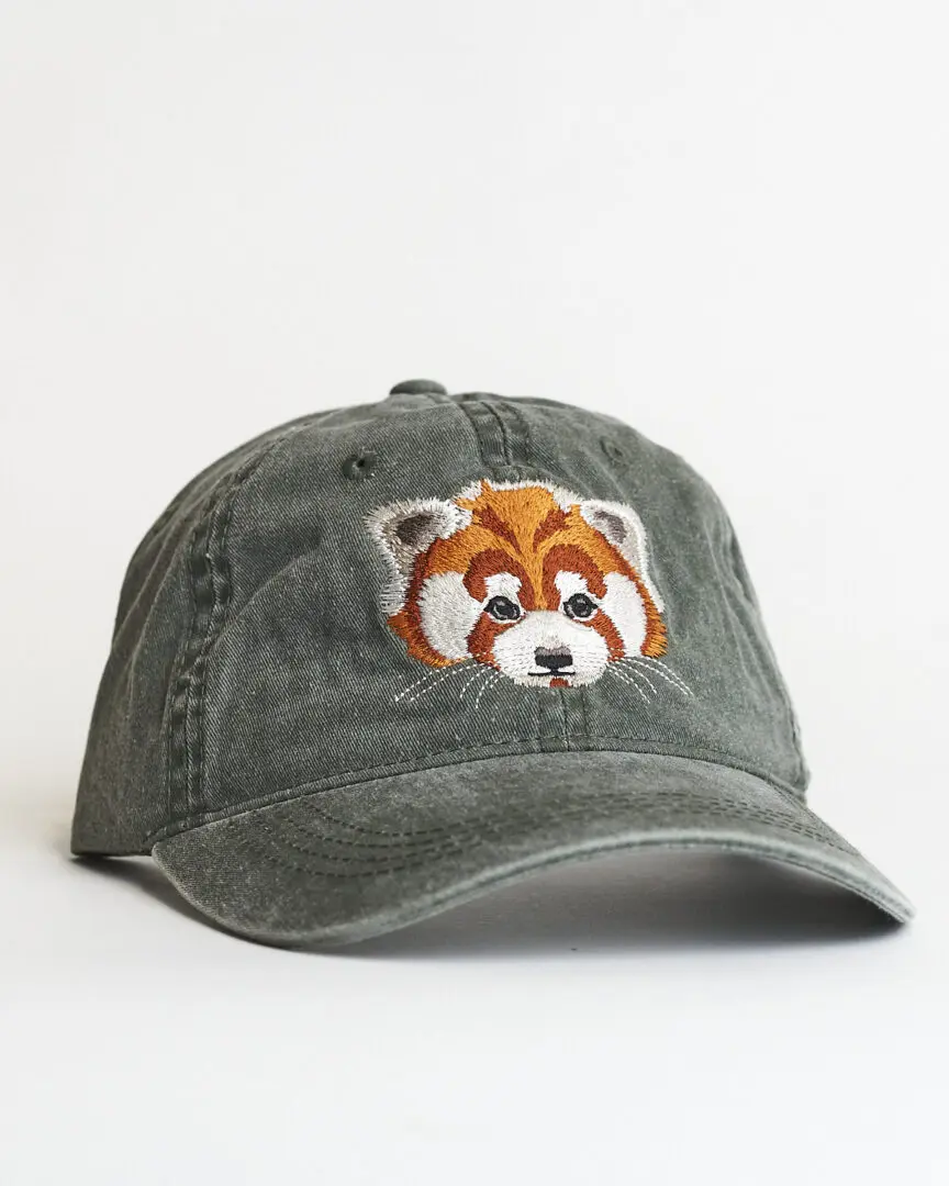 A hat with an animal face on it.