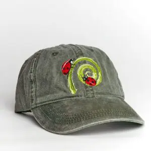 A green hat with a red and yellow snake on it.