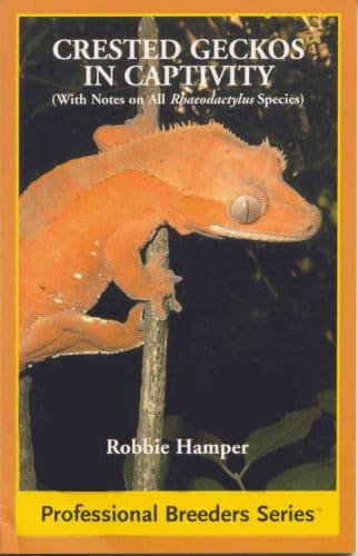 A book cover with an orange frog on it.