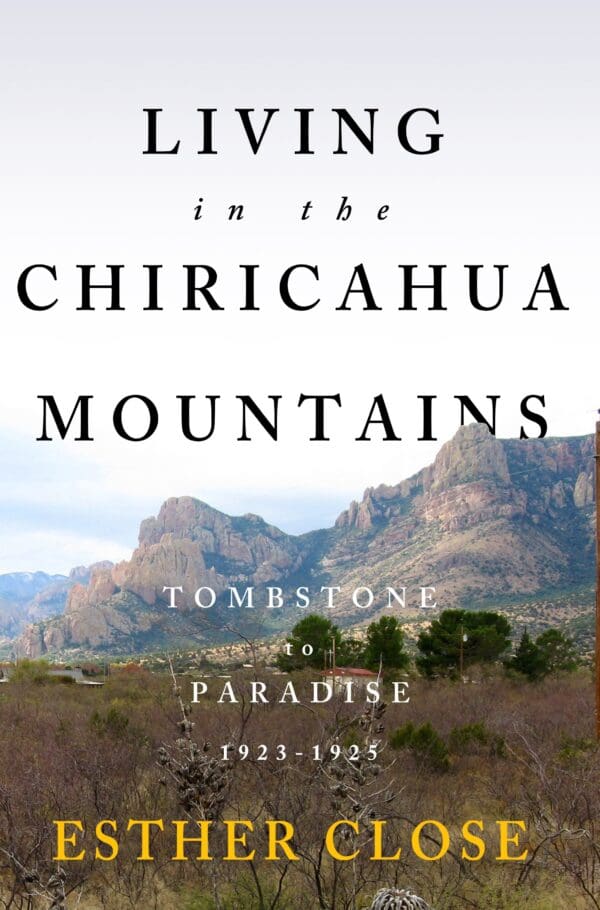 A book cover with mountains and trees in the background.