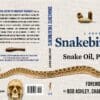 A book cover with a snake and skull